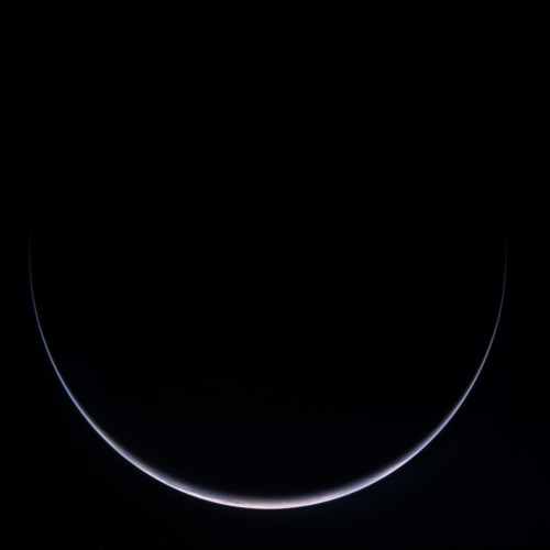 This delicate view of Earth was captured in 2007 on the second of three Earth flybys made by ESA’s c