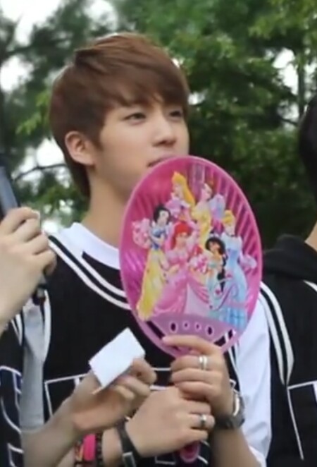 oldunnie: Nothing special, just Jin holding a pink disney princesses fan on 16th June 2013 at BTS se