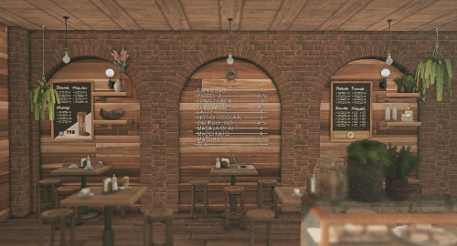 The Otterhouse A Quaint Coffee Shop, Right On The Road. With Big Modern Windows And A Rustic Interior,