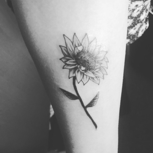 Tattoo number 14 - a sunflower . It represents happiness, growth, beauty and positivity for me. I am