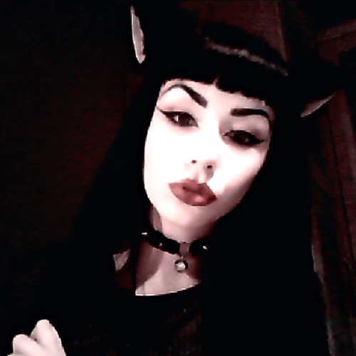 gothnrollx:  i got cat ears today hahaha as a amazon wishlist gift sorry for the piss poor photo but im just messing around wearing them tonight :3