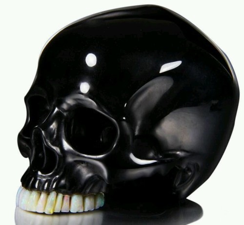 twenty1-grams:Black Obsidian Carved Crystal Skull with Opal Teeth and Detachable Jaw Sculpture