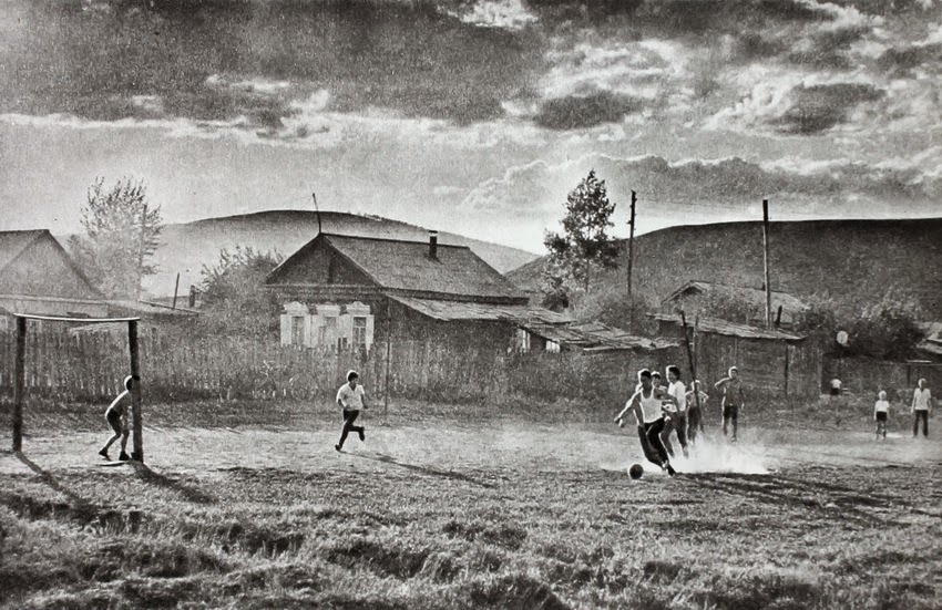 G. Arkatov. Rural football, Russia, 1980s.