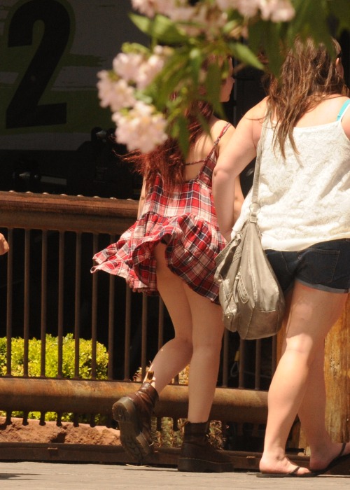 So just as I was pulling in to Bass Pro Shop this young ladies dress caught a nice breeze .