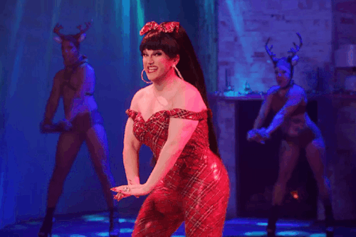 GIFset Of DeLa In The Tartan Pantsuit That Nobody Asked For