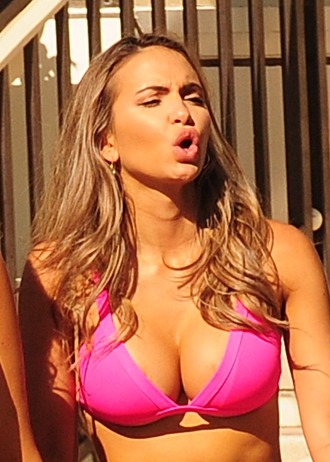 Not sure which I like better her big tits or those lips.