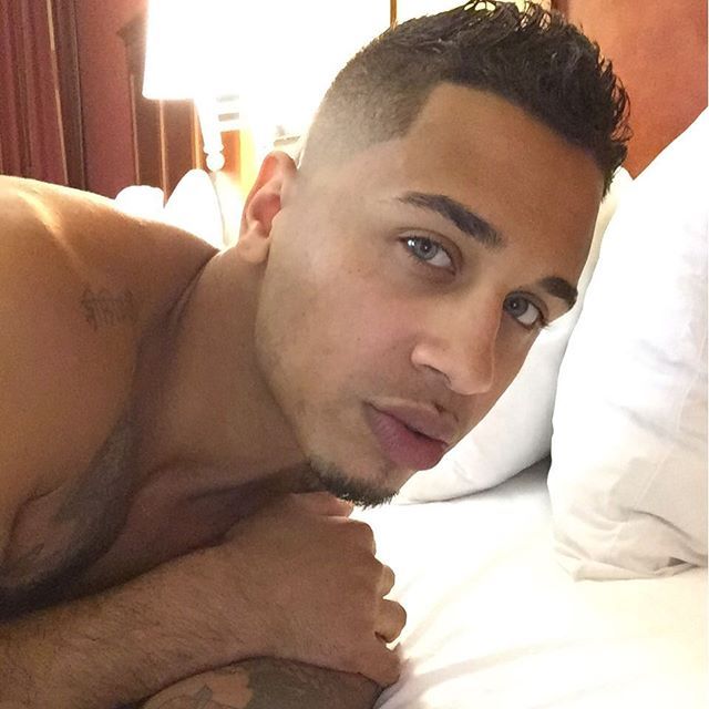dominicanblackboy:  A cute moment wit Sexy tatted blue eyed rican Blu Rose and that
