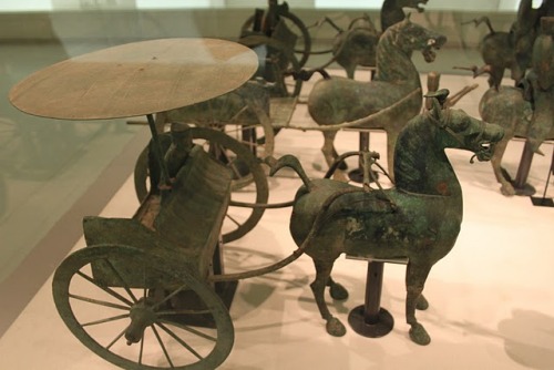 ancientart:An assortment of ancient Chinese bronze figurines depicting military cavalry and spoke-wh