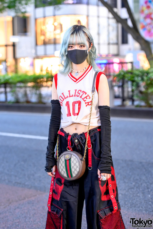 19-year-old Japanese student Nana on the street in Harajuku wearing a Hollister crop top she got fro