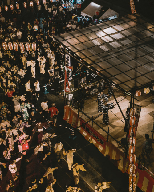 People dancing to the Bon-Dance Music and having fun in Koichi Matsuri Festival at Shinbashi this su