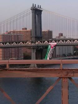 fuckyeahmarxismleninism:  Giant Palestinian Flag Unfurled From Manhattan Bridge To Protest Israeli Attacks On Gaza An enormous Palestinian flag was unfurled from the south side of the Manhattan Bridge earlier this evening as protesters marched across
