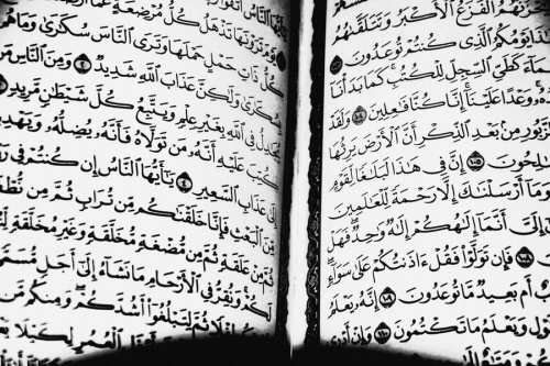 Open Book of Quran on Surat al-Anbya’ and Surat al-Haj