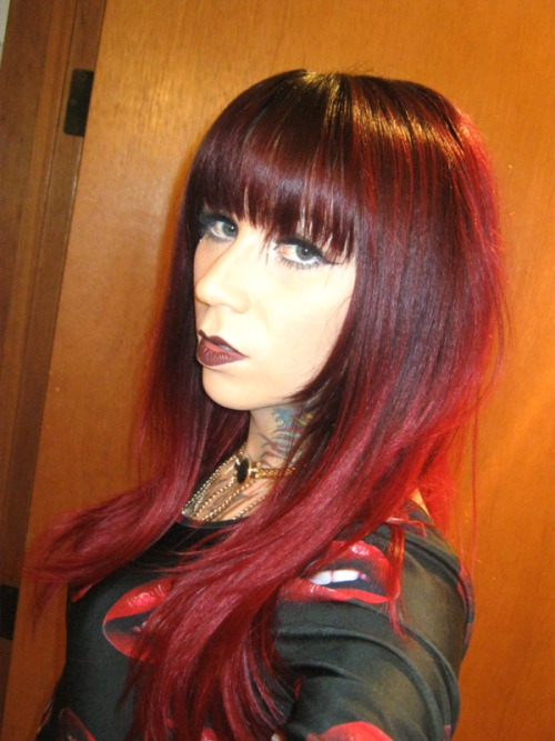 thegirlbornboy:  Loving this new color in my hair. What do you guys think? I’m so prone to sticking with black, but i might keep the faded red tones :)  
