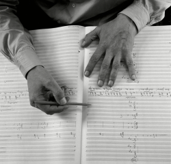 barcarole:   Hands of German composer Carl Orff with his score for Antigonae - a musical setting after   Hölderlin’s translation of the Sophocles tragedy, 1955, by Herbert List. 