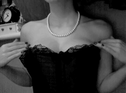midnightabsinthe:Look how elegant and delicate are the hand gestures above her breasts, emphasized by the corset… this girl seems just like me: I really love to wear a corset: personally,I think it’s one of the most important symbols of beauty and