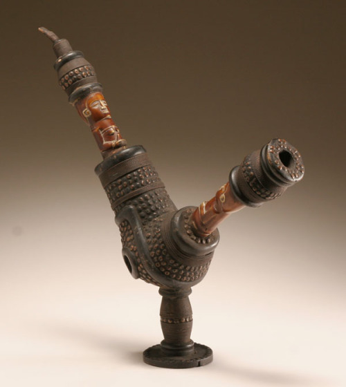 A hand carved kuba (smoking pipe) originating from Congo, 19th century.