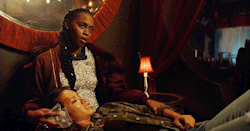 ladiesofblacklightning: [five gifs of anissa pierce tending to grace choi. grace is laying in anissa’s lap with a cup over her eyebrow, and anissa is icing her wound. grace reaches for anissa, and anissa softly looks down at grace.] 