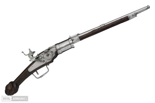 A Wheellock Pistol with a six-shot revolving cylinder, attributed to Paul Dubler,OaL: 27 in/68.5 cmB