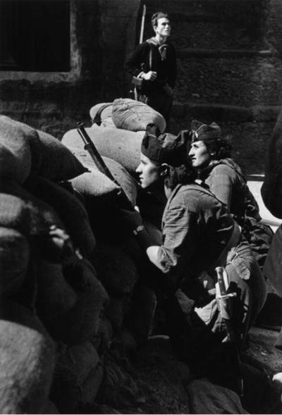 historicaltimes:
“Anti-fascist militia women defending a street barricade, Barcelona, 1936 by Robert Capa.
”
