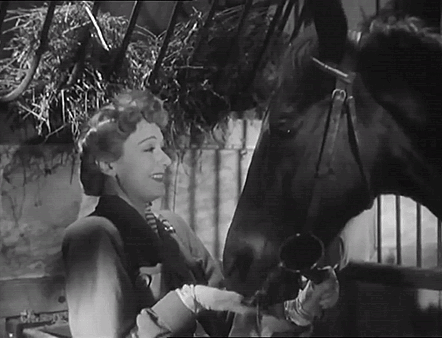 Something About Edwige Petting A Horse Just Has Me In Another Dimension