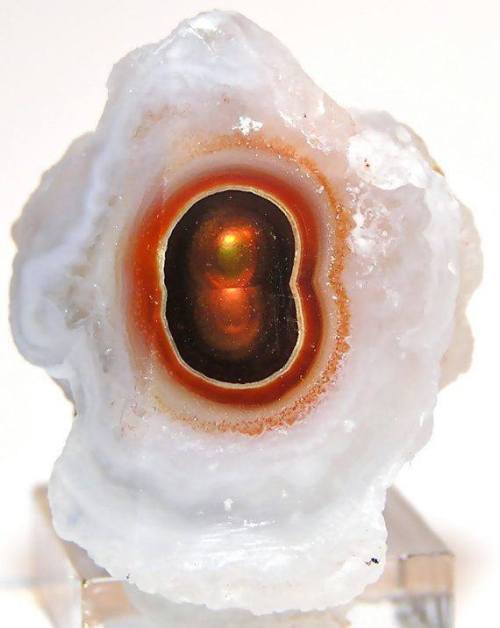 Quartz with a fiery heartLooking like a doorway into another dimension, this wonderful crystal of qu