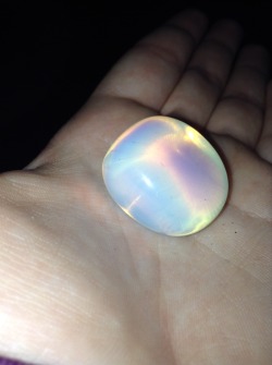 sugarplumbiscuit:  bakrua:  it’s gives off it’s own little patch of sunlight  where the fuck did you get a dragon tales’ stone  That is an opal with light passing through it, you uncultured swine.