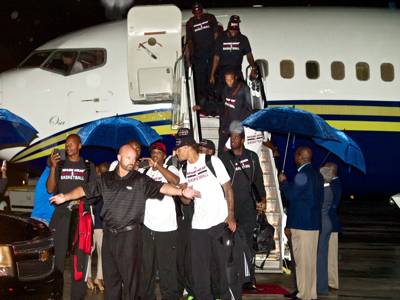 ruff-draft:  The Miami Heat arrive in The Bahamas for a training week. Soggy night,