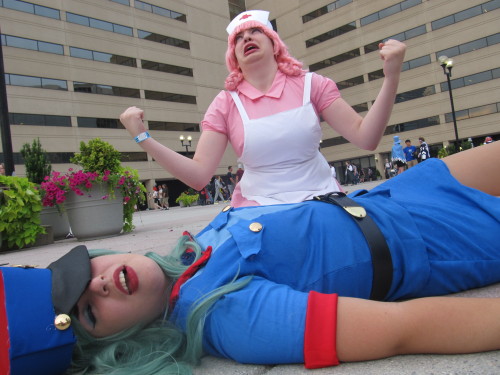 shade041: Otakon 2014 - Officer Jenny and Nurse Joy Officer Jenny: wiggglytuff Nurse Joy: hotgiraffe