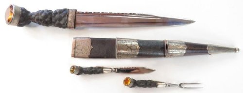 Scottish dirk, knife, and fork set mounted with silver and cairngorm quartz. Produced by Leckie, Gra