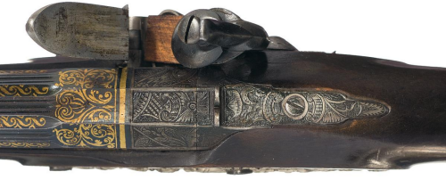 A matching set of engraved and gold inlaid flintlock pistols with Liege (Belgian) proof marks.  Late