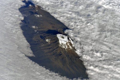 KilimanjaroCosmonaut Oleg Artemyev captured this gorgeous view of the Kilimanjaro volcanic complex s