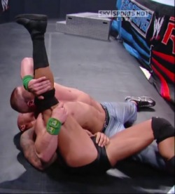 Randy can’t help but touch himself while he’s being pinned down by John