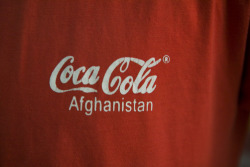 unrar: T-shirt worn by Kabul restaurant employee, Aj