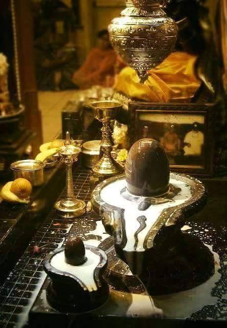 Shiva lingam with milk offerings