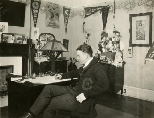 A college student studies in his room in the Pi Kappa Alpha fraternity house of the University of Ci