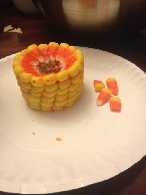 reservoirpups: my friend forced me to his party so i started melting together candy corn into a cand