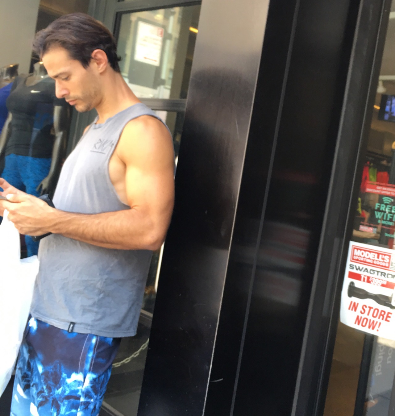 nychotguys:  Tank Top Hottie on Lexington Ave. NYC.Thanks EverydayHotness!