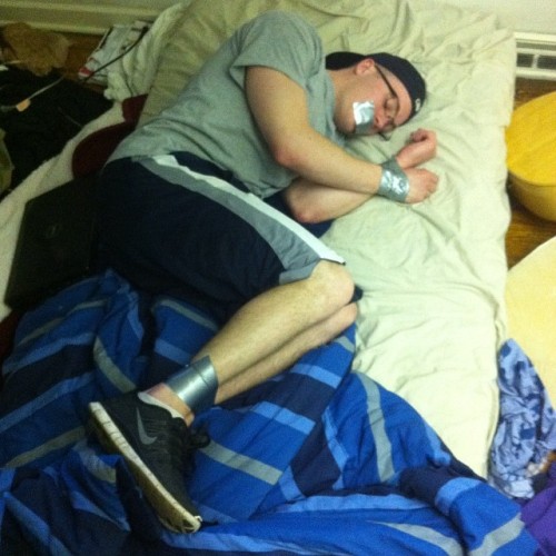 divineangelyue: mega-kink:   bondageforthebigman: This is rather sweet. first time he passed out drunk at his mates place he woke up with his feet duct tapped together, second time he blacked out his feet and hands where duct tapped together, third time