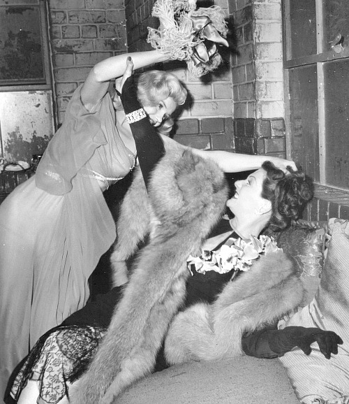 alwaysmarilynmonroe:  Rare photos of Marilyn having a cat fight in Ladies of The