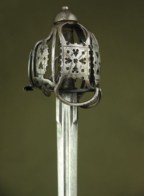art-of-swords:  Basket-hilt Sword Dated: 18th century Culture: Scottish Medium: steel The blade of the sword is most likely made during the 17th century, while the hilt, tick steel hilt decorated with pierced work and chiselled details, is 18th century.