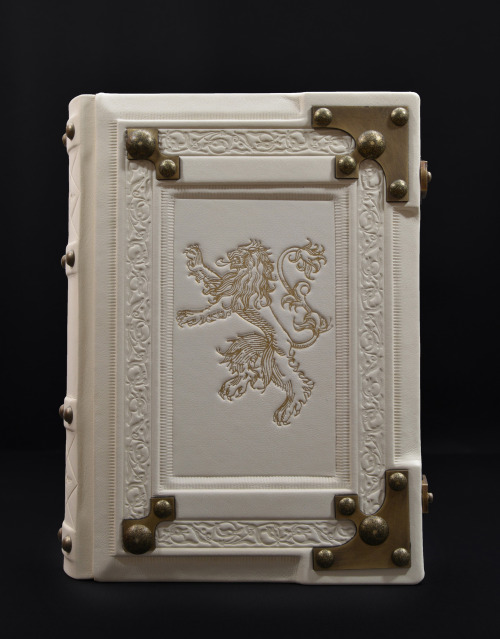 Large white leather book with the gilded lion&hellip; 8&quot; x 10&quot; large, 3&qu