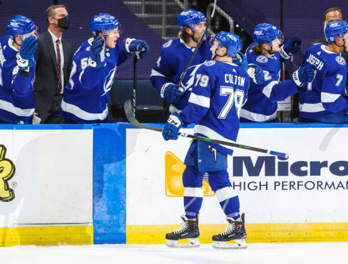 Ross Colton #79 of the Tampa Bay Lightning celebrates his first NHL goal with teammates against the 