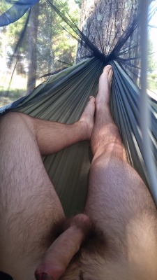 nakedpublicfun:  Relaxing naked in his garden