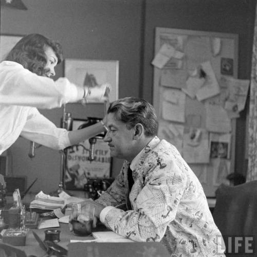Preston Sturges gets a touch up from Frances Ramsden(Peter Stackpole and John Florea. 1948)