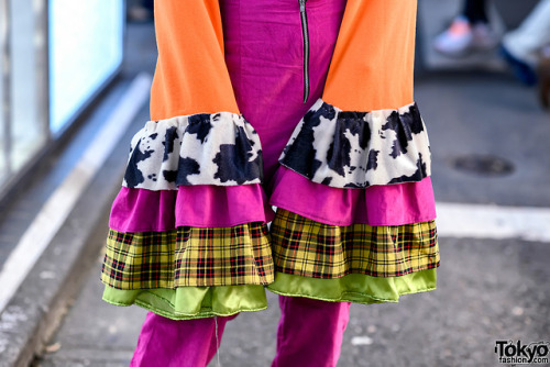 Tokyo-based stylist Pio on the street in Harajuku wearing a handmade ruffle top with oversized flare