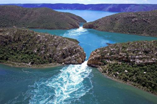 earthstory:  Horizontal FallsKnown to local western Australians as The Horries, an interesting illusion makes them resemble a pair of waterfalls falling across the surface of Talbot Bay. In fact, the narrow gaps between the rock connecting the mouth of