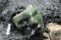 sixpenceee:A 2000 years old green serpentine stone mask was found at the base of Pyramid of the Sun in Teotihuacán, Mexico. Along with this researchers found pieces of obsidian and pottery and animal remains. Archaeologists believe they maybe placed