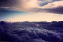 grett:  Above the clouds by San Budi on Flickr.