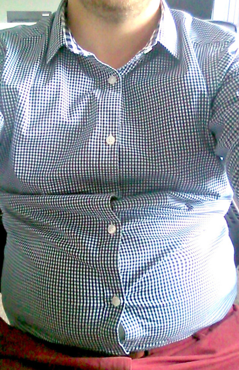 chubbyfrenchy:  Loving how my tight shirts show how much weight I’ve gained since I started my internship :-)