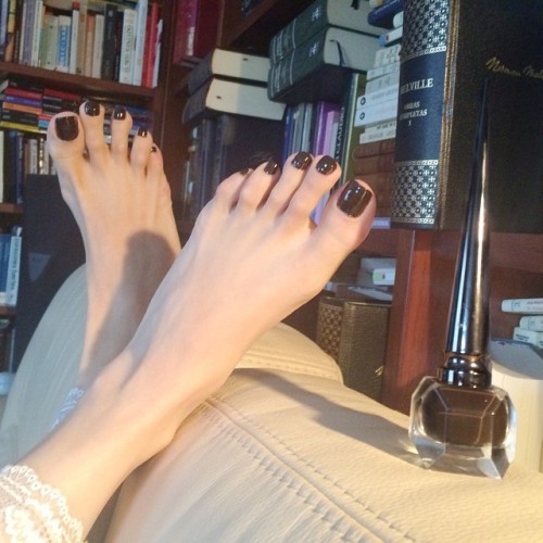 mistressnatalie:  Feet of course.  Kheops nail colour from Christian Louboutin